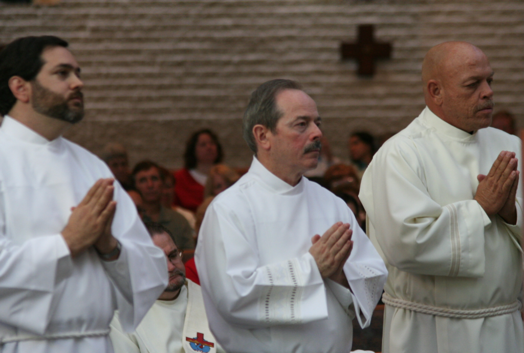 Deacon Greg Galloway, right, is pictured during his 2006 ordination. (Catholic Sun file photo)