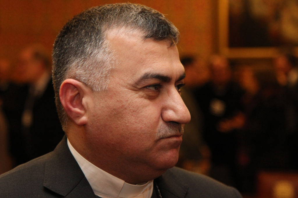 Archbishop Bashar Warda of Irbil, Iraq, as seen Feb. 9 in the House of Lords in London. The Iraqi archbishop called for U.S. boots on the ground in Iraq to rid the country of the ÒcancerÓ of Islamist extremism that is threatening the genocide of his people. (CNS photo/ Simon Caldwell)  