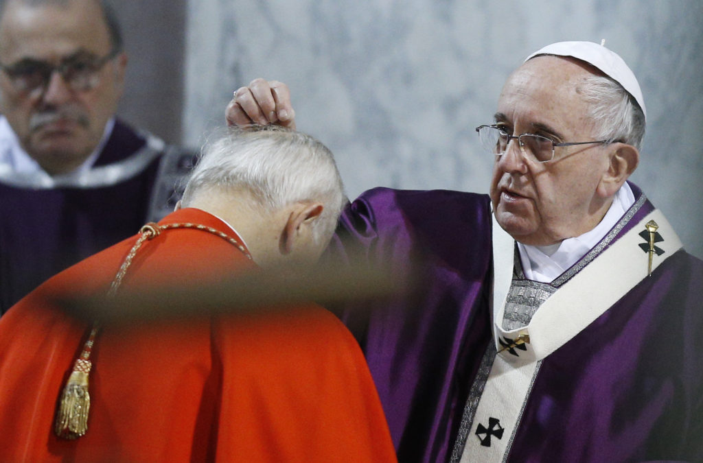 Pope Francis places ashes on the head of Cardinal Jozef Tomko during Ash Wednesday Mass at the Basilica of Santa Sabina in Rome Feb. 18. (CNS photo/Paul Haring) 