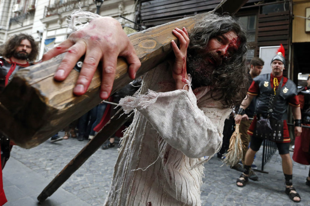Actors take part in a 2014 re-enactment of the Way of the Cross which commemorates the crucifixion of Jesus during the Orthodox Holy Week celebrations in Bucharest, Romania April 15. (CNS photo/Bogdan Cristel, Reuters)