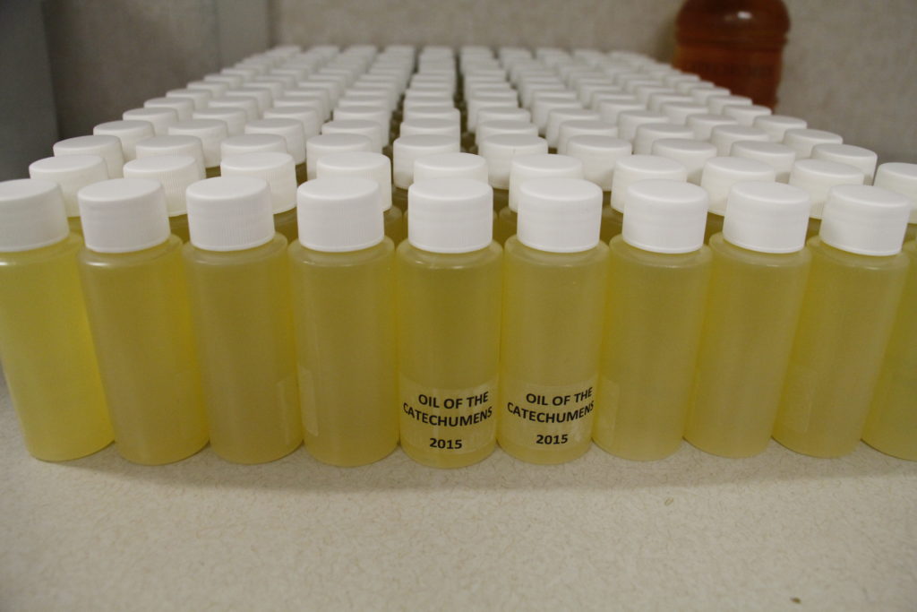 The diocesan Office of Worship prepared individual bottles of fragrant chrism oil for parish leaders to take home following the March 30 Chrism Mass at Ss. Simon and Jude Cathedral (Ambria Hammel/CATHOLIC SUN)