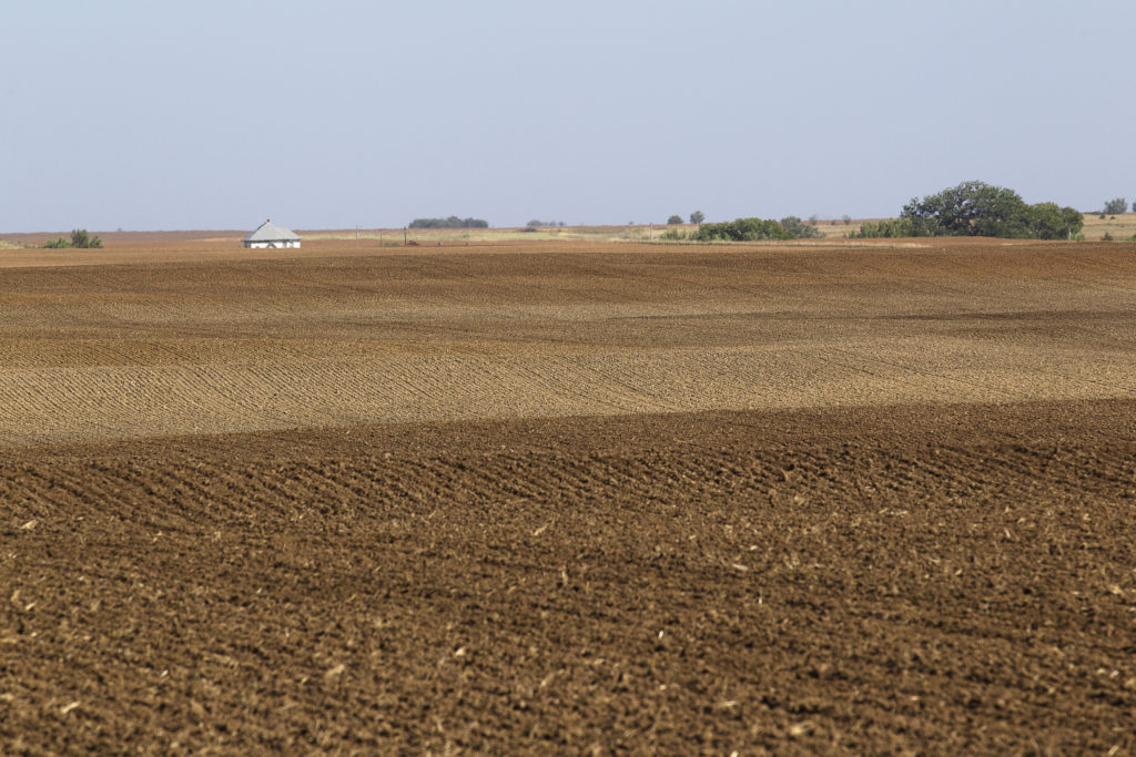 A freshly plowed field is seen in 2013 on a farm in St. Leo, Kan., about two hours southwest of ____ (CNS photo/Tyler Orsburn)