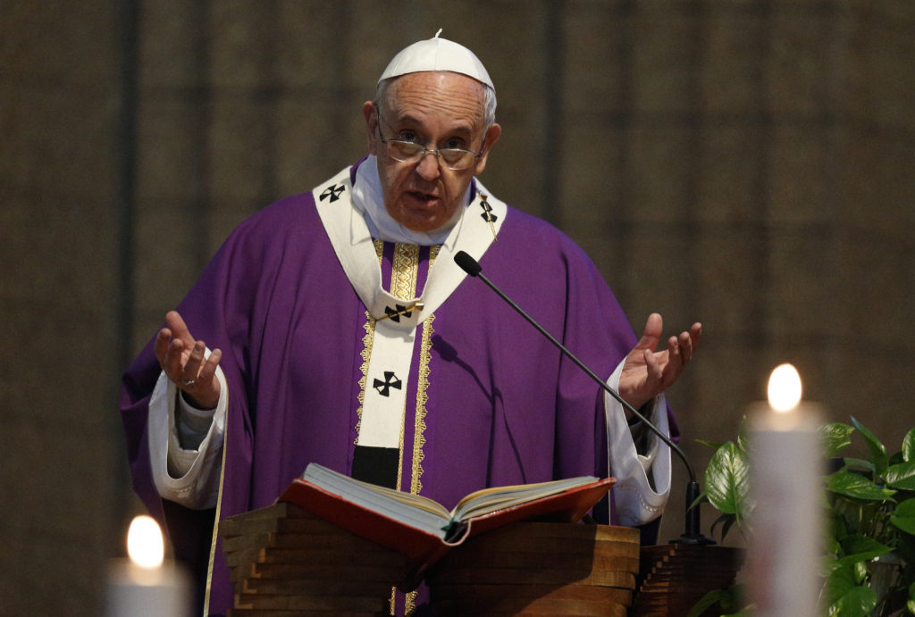 Pope Francis gives the homily while celebrating Mass at St. Mary Mother of the Redeemer Parish on the outskirts of Rome March 8. (CNS photo/Paul Haring) 