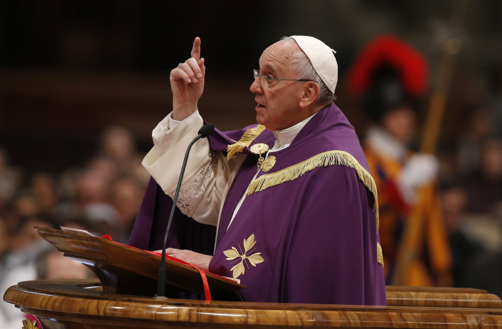 Pope Francis gestures as he preaches during a Lenten penance service in St. Peter's Basilica at the Vatican March 13. During the service the pope announced an extraordinary jubilee, a Holy Year of Mercy, to be celebrated from Dec. 8, 2015, until Nov. 20, 2016. (CNS photo/Paul Haring) 