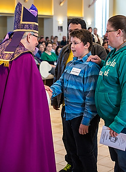 The Rite of Election is the beginning of the final stage of preparing people for initiation into the church at the Easter Vigil. More than 200 candidates and catechumens, along with their sponsors and family members, attended the service. (CNS photo/Sam Lucero, The Compass)