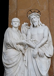 Pontius Pilate introduces Jesus in this statue at the base of the Holy Stairs in Rome in this March 10, 2014, file photo. Tradition maintains that Jesus climbed the stairs when Pilate brought him before the crowd. It's believed that Constantine's mother, St. Helen, brought the stairs to Rome from Jerusalem in 326. (CNS photo/Paul Haring)