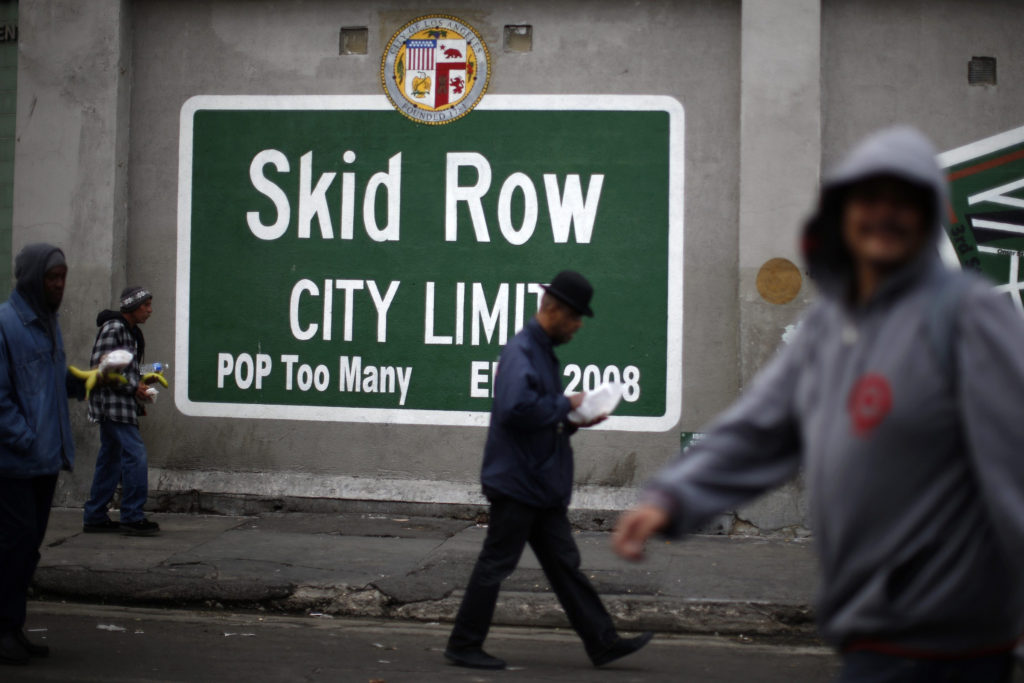 People walk around Skid Row in Los Angeles March 2. Catholic advocates are pushing Congress for a budget that protects poor people. (CNS photo/Lucy Nicholson, Reuters)