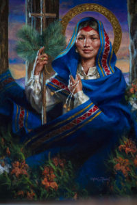 A painting portraying St. Kateri Tekakwitha is seen during a Mass of thanksgiving celebrated in honor of her Oct. 21 at the Shrine of Our Lady of Martyrs in Auriesville, N.Y. Pope Benedict XVI created seven new saints the same day, including St. Kateri, a 16th-century Mohawk-Algonquin woman known as the "Lily of t he Mohawks." She is regarded as the first Native American saint. (CNS photo/Jason Greene, Reuters)