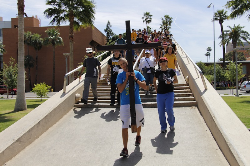 The Good Friday Stations of the Cross at Arizona State University drew hundreds of students, adults and families April 3, 2015. It moved throughout campus and concluded atop "A" Mountain. (Ambria Hammel/CATHOLIC SUN)