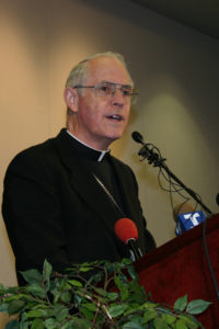Santa Fe Archbishop Michael J. Sheehan introduces Bishop Thomas J. Olmsted as the fourth bishop of Phoenix at a press conference on Nov. 25, 2003 at the Diocesan Pastoral Center. Archbishop Sheehan served as the apostolic administrator of the Diocese of Phoenix from June 18 to Nov. 25, 2003.