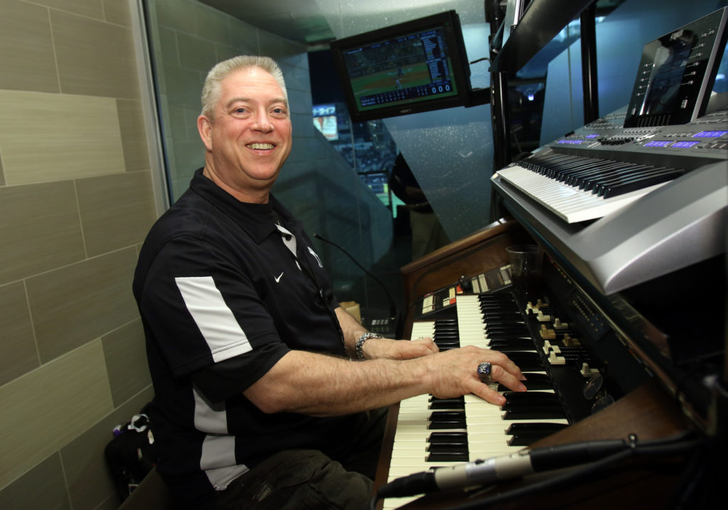New York Yankees organist Paul Cartier poses for a photo during a Major League Baseball game between the Yankees and the Toronto Blue Jays at Yankee Stadium in the Bronx, N.Y., April 8. Cartier is also an organist for the National Hockey League's New York Islanders and at Our Lady of Hope Parish in Carle Place, N.Y. (CNS photo/Gregory A. Shemitz)