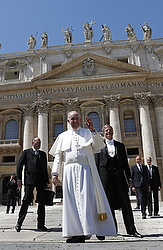 Pope Francis waves as he leaves his general audience in St. Peter's Square at the Vatican April 22. (CNS photo/Paul Haring) 