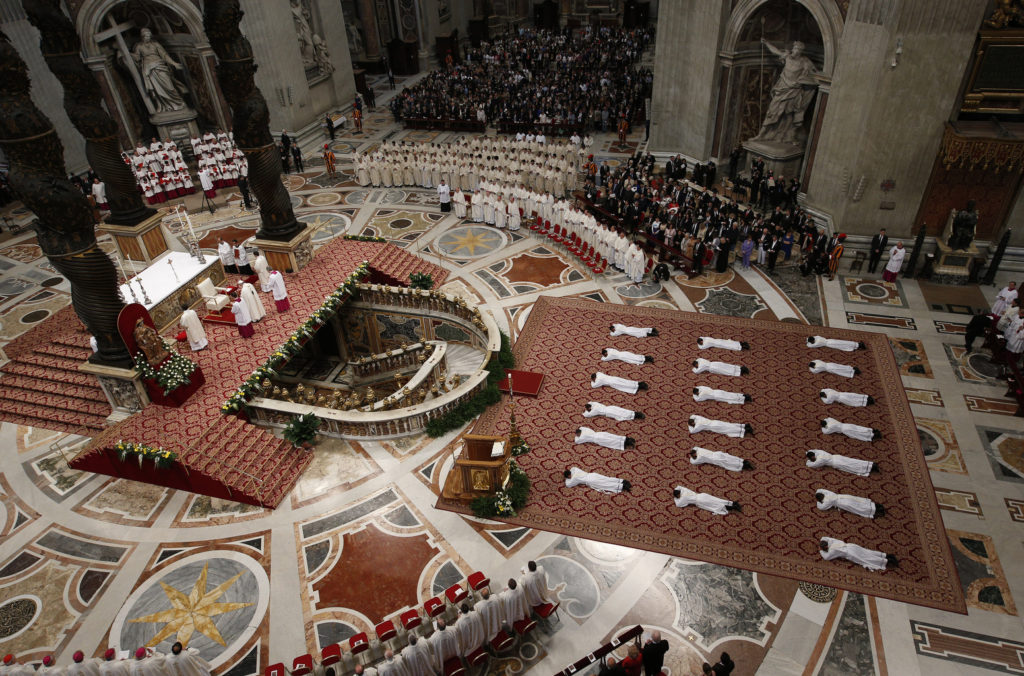 Pope Francis celebrates the ordination Mass for 19 new priests in St. Peter's Basilica at the Vatican April 26. In his homily, the pope told the new priests to make sure their homilies were not boring. (CNS photo/Paul Haring)