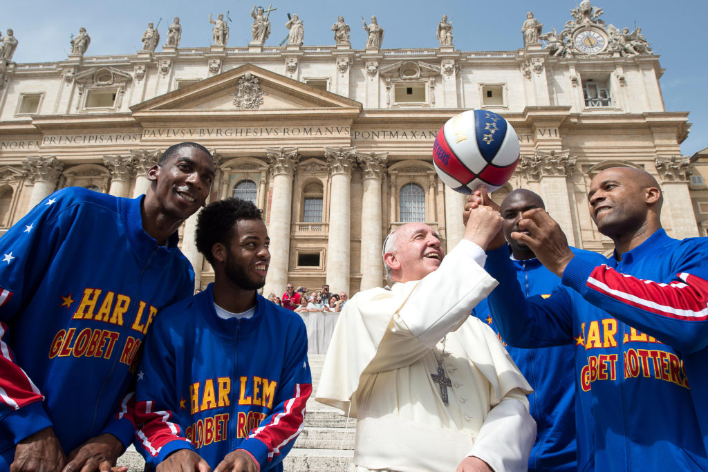 In celebration of their upcoming 90th anniversary tour, the Phoenix-based Harlem Globetrotters met with Pope Francis and named him just the ninth Honorary Harlem Globetrotter in team history on May 6 at St. Peter’s Square. The accolade recognizes an individual of extraordinary character and achievement who has made an everlasting mark on the world. Pictured in the attached image (l-r): Hi-Lite Bruton, Ant Atkinson, Pope Francis, Big Easy Lofton, Flight Time Lang.  (Photo © L'Osservatore Romano Foto.)