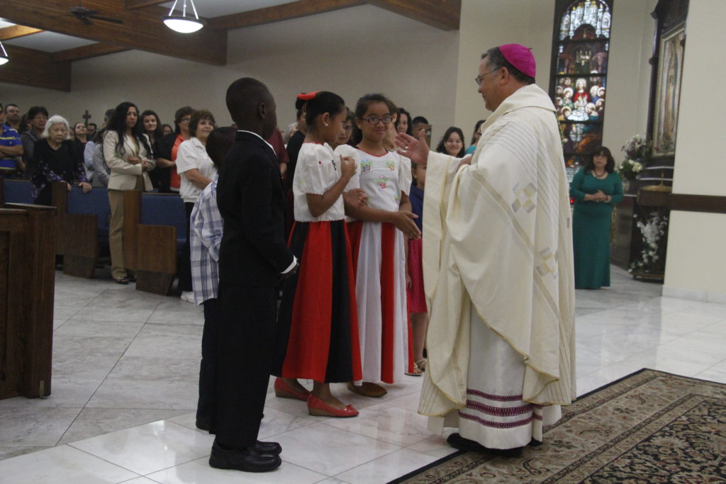 Bishop Eduardo A. Nevares greets  (Ambria Hammel/CATHOLIC SUN)