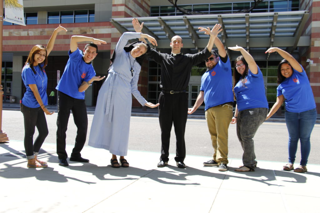 Some leaders of the first Youth Catholic Congreso mimic the event’s “CYC” logo with their arms as one of may ways of promoting the first bilingual congress for youth and young adults coming June 12-14 to the Phoenix Convention Center. The theme is “Jóvenes: Set the World on Fire”. Follow fellow youth as they prepare for the inaugural event: #YCC2015