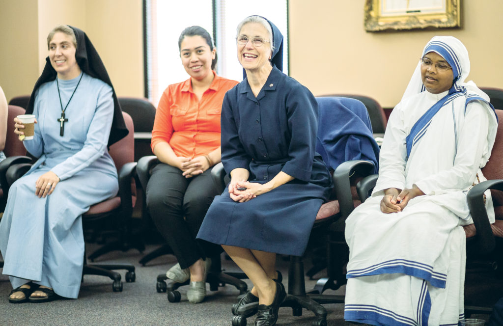 Sr. Anthony Mary Diago, RSM, Cynthia Estrada, a postulant with the Daughters of Charity, Sr. Cabrini Tomas, DC, and Sr. Bernadette Ann, MC, took part in the morning of discernment for women May 2 at the Diocesan Pastoral Center. (Billy Hardiman/CATHOLIC SUN)