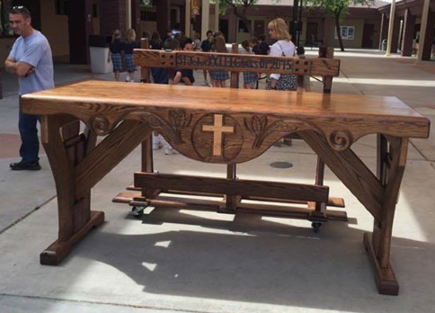 The eighth-graders presented St. John XXIII School with a portable altar during their last all-school Mass May 20. (photo from St. John XXIII Facebook page)