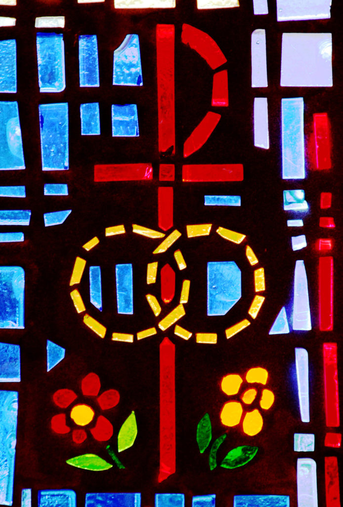 A pair of wedding bands symbolizing the sacrament of marriage is depicted in a stained-glass window at St. Isabel Church in Sanibel, Fla. (CNS photo/Gregory A. Shemitz) 