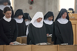 Benedictine nuns pray in the chapel in late March at the Abbey of St. Walburga on a ranch in Virginia Dale, Colo. The community of 24 Benedictine nuns pray, run a ranch and maintain a retreat house for individuals and groups. (CNS photo/Jim West) 