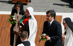 Devotees present a relic of new Saint Mary of Jesus Crucified during the canonization Mass for four new saints celebrated by Pope Francis in St. Peter's Square at the Vatican May 17. The pope canonized four 19th-century nuns.  (CNS photo/Paul Haring) 