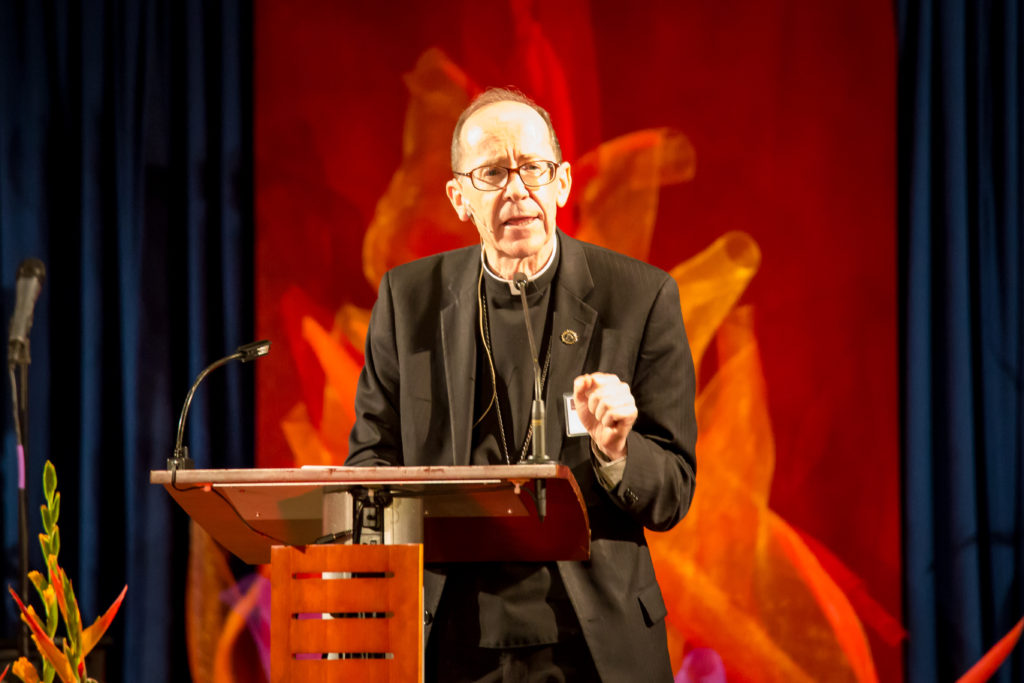 Bishop Thomas J. Olmsted speaks during the John 17 Movement Celebrating Christian Unity event at the downtown Phoenix Convention Center on May 23, 2015. (Billy Hardiman/CATHOLIC SUN)