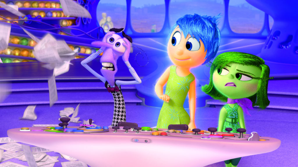 Animated characters Fear, Joy and Disgust appear in the movie "Inside Out." The Catholic News Service classification is A-II — adults and adolescents. The Motion Picture Association of America rating is PG — parental guidance suggested. Some material may not be suitable for children. (CNS photo/courtesy Disney-Pixar) 
