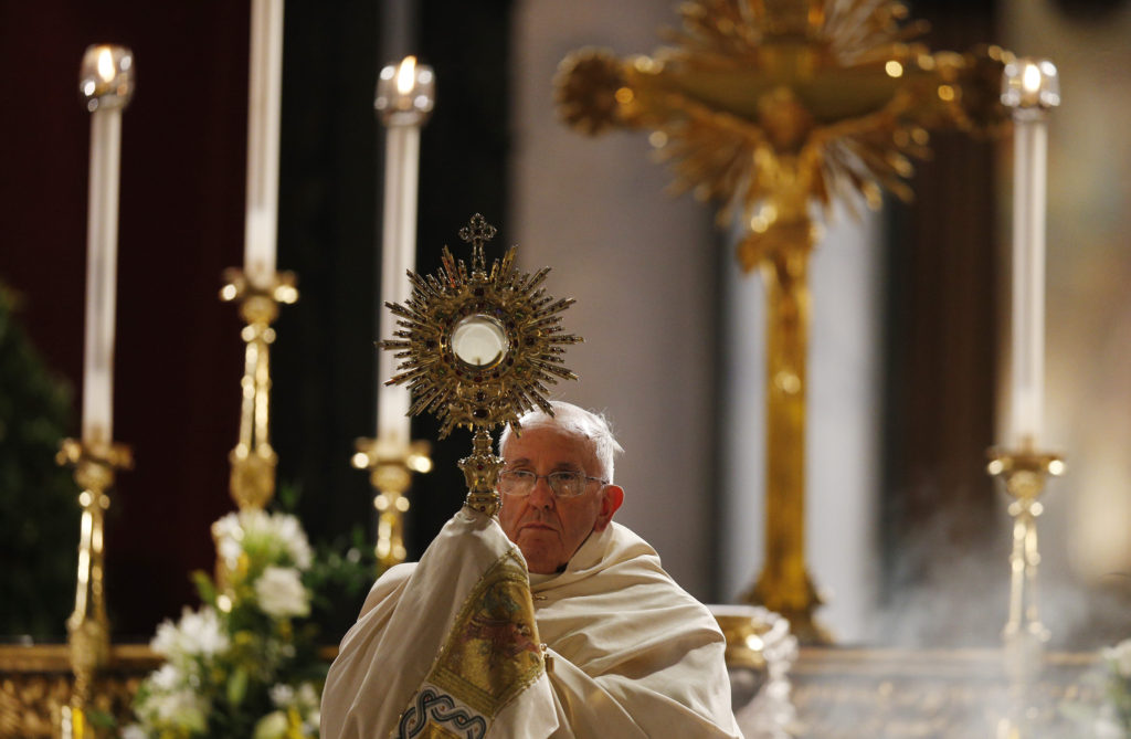 Pope Francis leads Benediction outside the Basilica of St. Mary Major on the feast of Corpus Christi in Rome June 4. (CNS photo/Paul Haring) 
