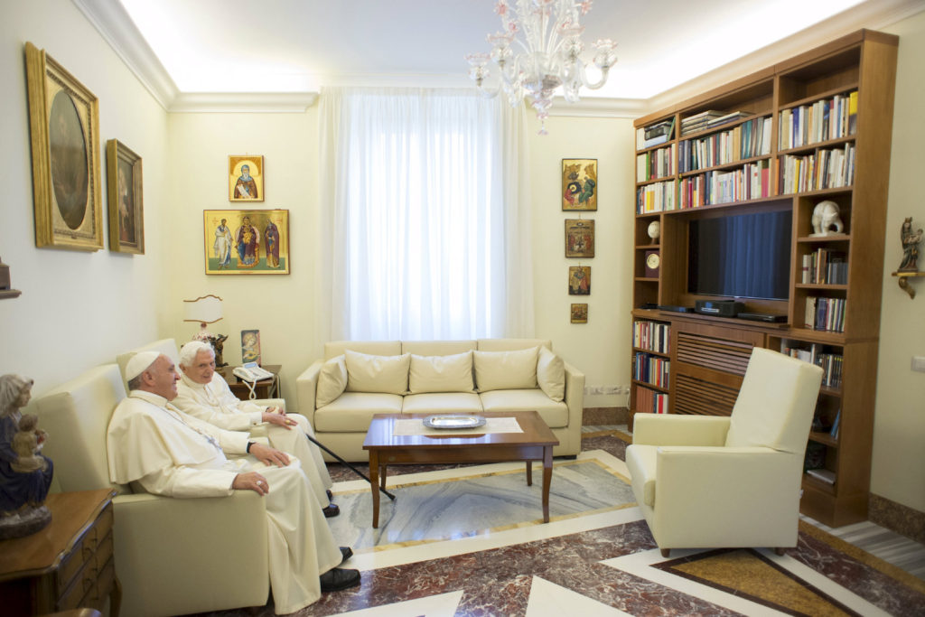 Pope Francis chats with retired Pope Benedict XVI during a meeting at the Vatican June 30. (CNS photo/L'Osservatore Romano via Reuters ) 