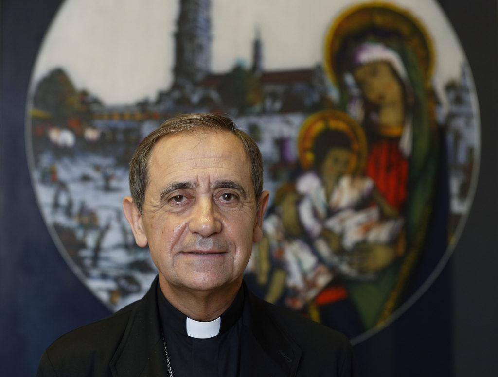 Bishop Juan Ignacio Arrieta, secretary of the Pontifical Council for Legislative Texts, is pictured in his office at the Vatican June 2. Bishop Arrieta explained why Pope Francis is appointing "missionaries of mercy" to preach and teach during the Holy Year of Mercy, which opens Dec. 8 and runs until Nov. 20, 2016. (CNS photo/Paul Haring) 