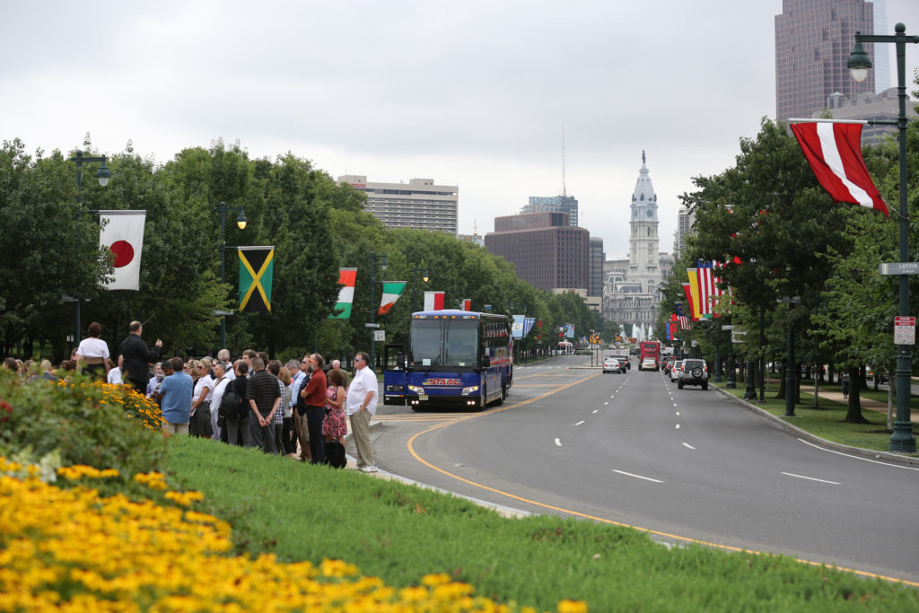 Members of the media gather along Benjamin Franklin Parkway in Philadelphia  during a July 9 preview tour for Pope Francis' trip to the U.S. in September. (CNS photo/Bob Roller)