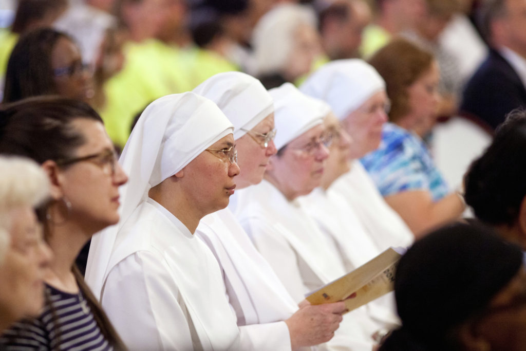 Members of the Little Sisters of the Poor attend the 2014 celebration of the third annual Fortnight for Freedom Mass at the Basilica of the National Shrine of the Assumption of the Blessed Virgin Mary in Baltimore. The 10th U.S. Circuit Court of Appeals ruled July 14 the Little Sisters and other religious entities are not substantially burdened by federal procedures that would enable them to avoid providing contraceptives in health insurance coverage. (CNS photo/Tom McCarthy Jr., Catholic Review) 