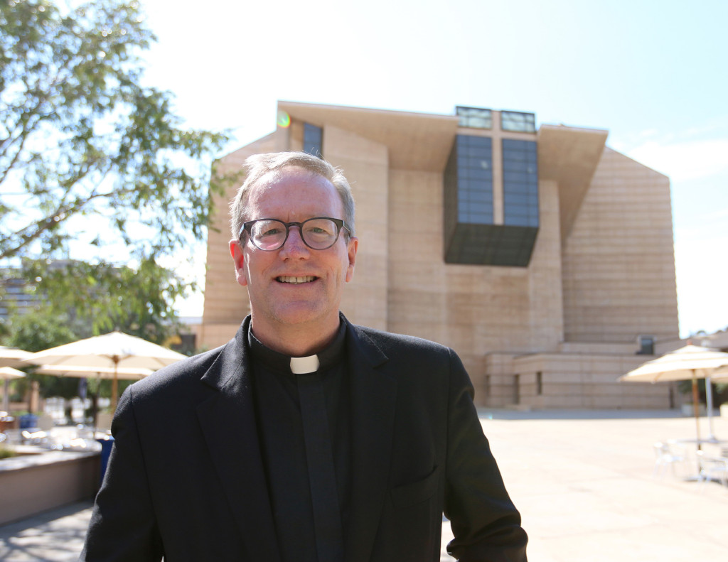 Father Robert Barron is pictured in front of the Cathedral of Our Lady of the Angels in Los Angeles July 20. Pope Francis has named Father Barron an auxiliary bishop for the Archdiocese of Los Angeles. Father Barron, 55, is a native of Chicago who has served as rector of Mundelein Seminary and president of the University of St. Mary of the Lake, also in Mundelein, Ill., since 2012. (CNS photo/J.D. Long-Garcia, The Tidings)