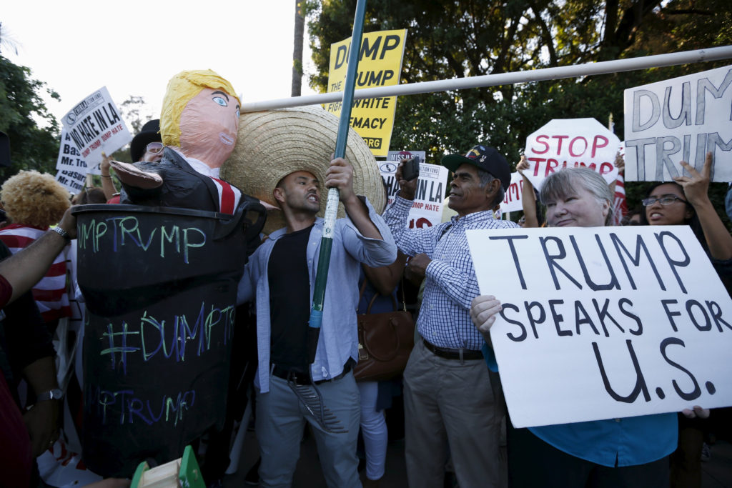 Opponents and supporters of Republican presidential candidate Donald Trump demonstrate outside a Los Angeles hotel July 10. (CNS photo/Lucy Nicholson, Reuters)