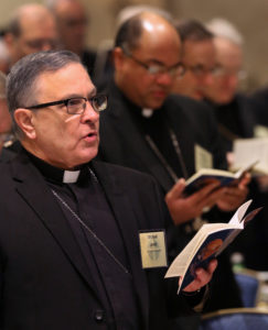 Bishop Michael Jarrell of Lafayette, La., sings during the morning prayer Nov. 11 at the 2014 fall general assembly of the U.S. Conference of Catholic Bishops in Baltimore. Bishop Jarrell offered prayers for the victims of a July 23 shooting at a movie theater in his diocese. (Bob Roller/CNS photo) See BISHOPS- Nov. 10, 2014, and Nov. 11, 2014.