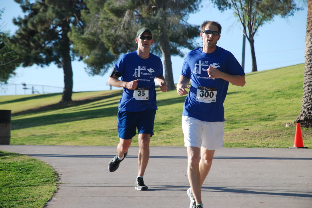 Bryan Boll (left) and Dan Miriovsky, founding members of the Gilbert chapter of LIFE Runners, completed the Nun Run in March as its first official event. The group hopes other Arizona runners join the race to end abortion. (courtesy photo)