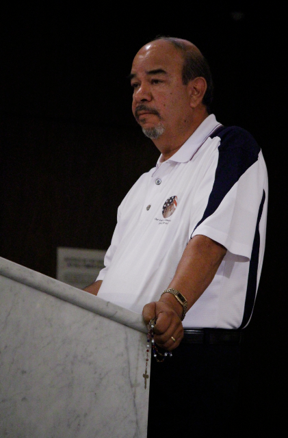 Manny Yrique, who spearheaded the Rosary for the United States of America in 2011, reminds a full Ss. Simon and Jude Cathedral July 4 of the Blessed Mother's claim to this nation from the onset.  He said praying the rosary will have the Blessed Mother leading her children to where real change occurs: at the foot of the cross of Jesus (Ambria Hammel/CATHOLIC SUN)