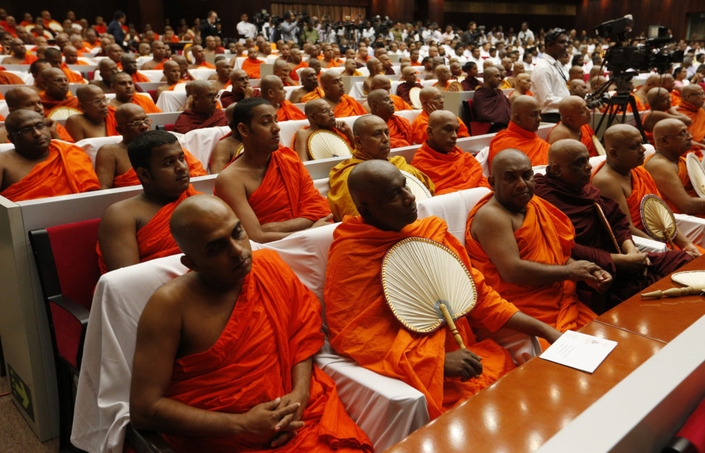 Buddhist monks attend Pope Francis' meeting with religious leaders at the Bandaranaike Memorial International Conference Hall in Colombo, Sri Lanka, Jan. 13. (CNS photo/Paul Haring) 