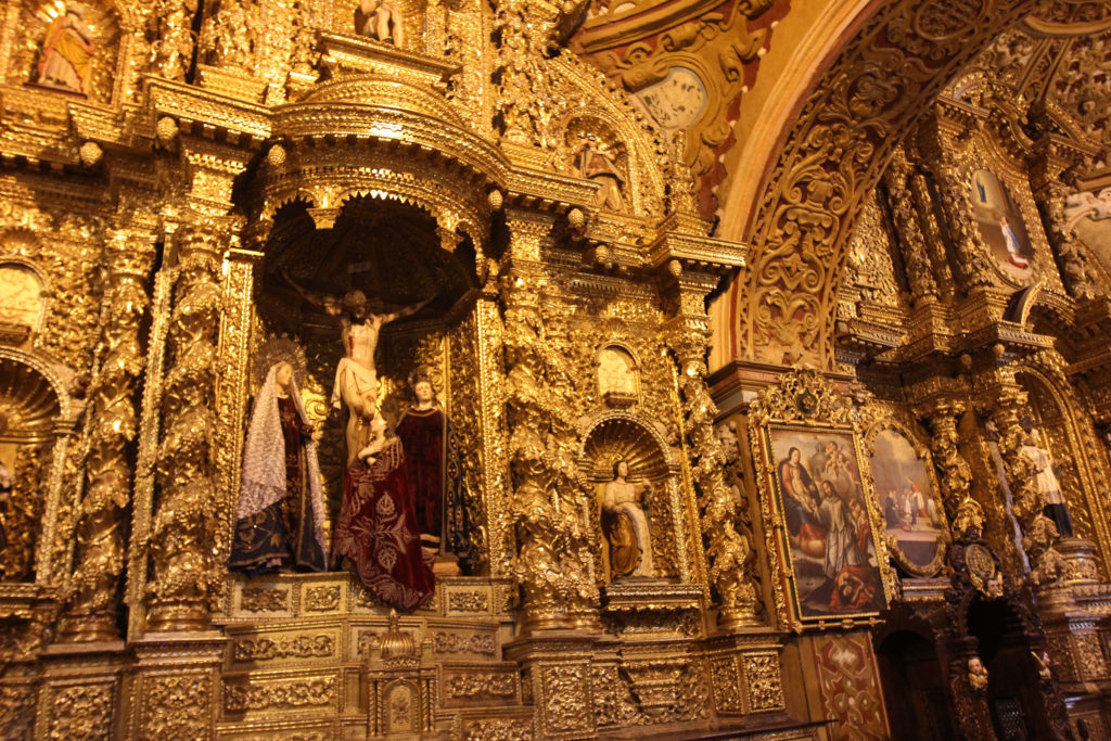 More than 100 pounds of gold leaf adorns the side altars of the Iglesia de la Compania in Quito, Ecuador's Jesuit church. (CNS/Barbara Fraser) 