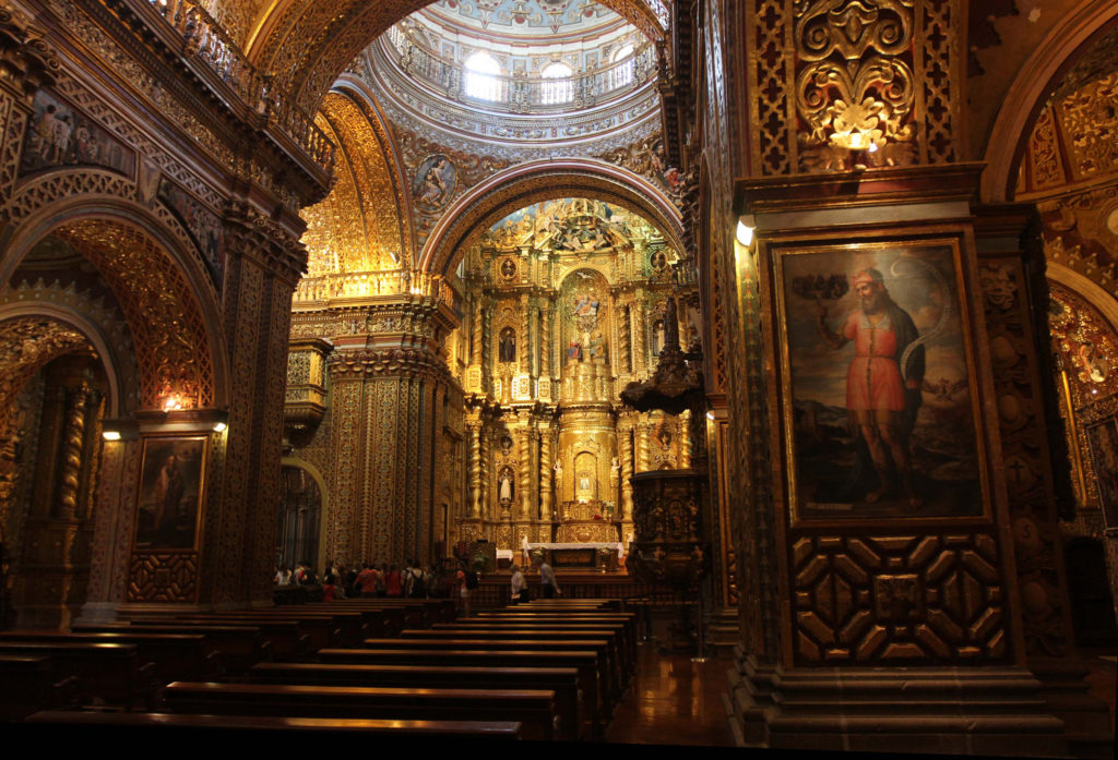 The pope requested private prayer time before the image of Our Lady of Sorrows, which hangs over the altar in Iglesia de la Compania, in Quito's colonial-era Jesuit church. (CNS/Barbara Fraser) 