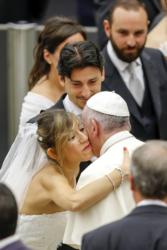 Pope Francis greets newly married couples during his weekly audience in Paul VI hall at the Vatican Aug. 5. (CNS photo/Giampiero Sposito, Reuters)