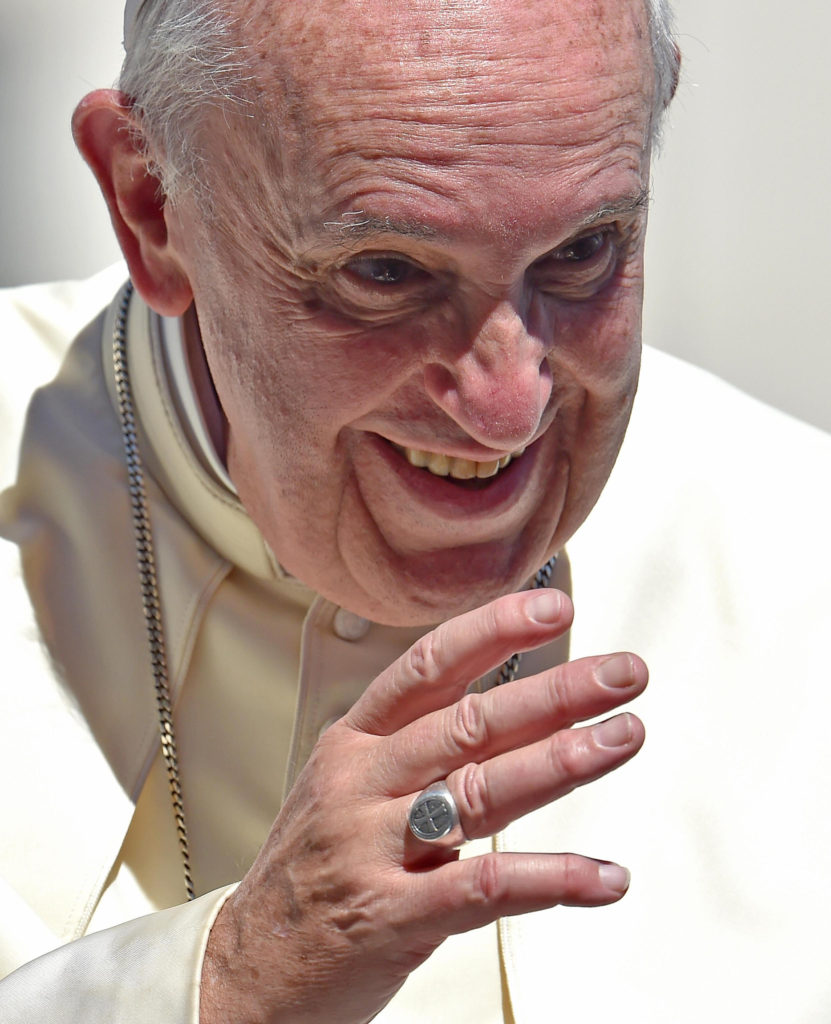 Pope Francis smiles during his weekly audience in St. Peter's Square at the Vatican Aug. 26. (CNS photo/Ettore Ferrari, EPA) 