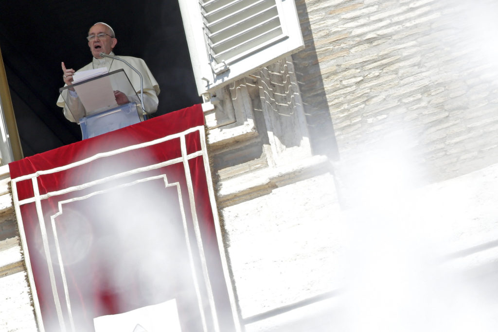 Pope Francis leads the Angelus from the window of his studio overlooking St. Peter's Square at the Vatican Aug. 30. (CNS photo/Max Rossi, Reuters) 