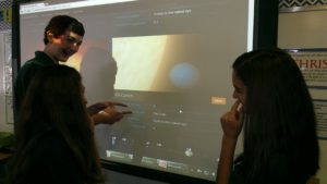 San Francisco de Asís students show what look for on screen in order to vote online for their proposed name of some newly discovered exoplanets. (courtesy photo)
