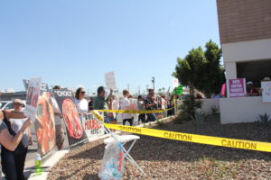 Pro-lifers surround the Planned Parenthood building. Some engaged in dialogue with those attending Planned Parenthood's counter-protest. (Justin Bell/CATHOLIC SUN)