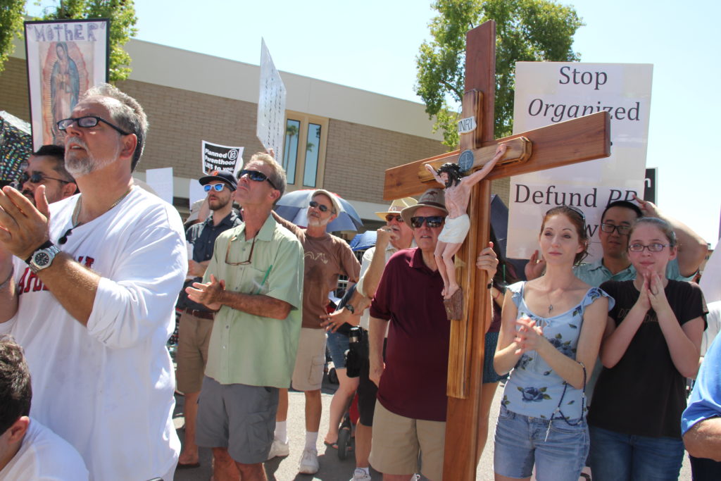 Approximately 1,600 pro-lifers gathered outside Planned Parenthood's downtown Phoenix location Aug. 22 to protest the abortion giant in light of undercover videos release that show the organization's officials discussing the sale of body parts from aborted children. (Justin Bell/CATHOLIC SUN) 