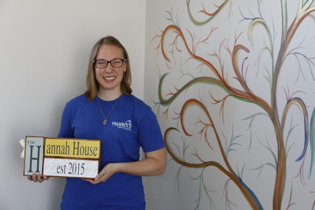 Gretchen Smith, director general of The Hannah House, stands near the tree of life mural that will soon archive the names of pregnant moms and, ultimately their babies, on heart-shaped leaves as who are welcomed into the fourth Maggie's Place home in the Valley. (Ambria Hammel/CATHOLIC SUN)