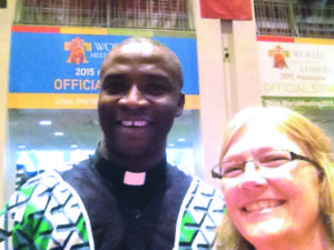 Selfie with Fr. Jude Nwigwe, who is attending the World Meeting of Families with 110 pilgrims from Nigeria. He said he can't wait to return home to his parish of 7,000 and share the pope’s message. (Gina Keating/CATHOLIC SUN)