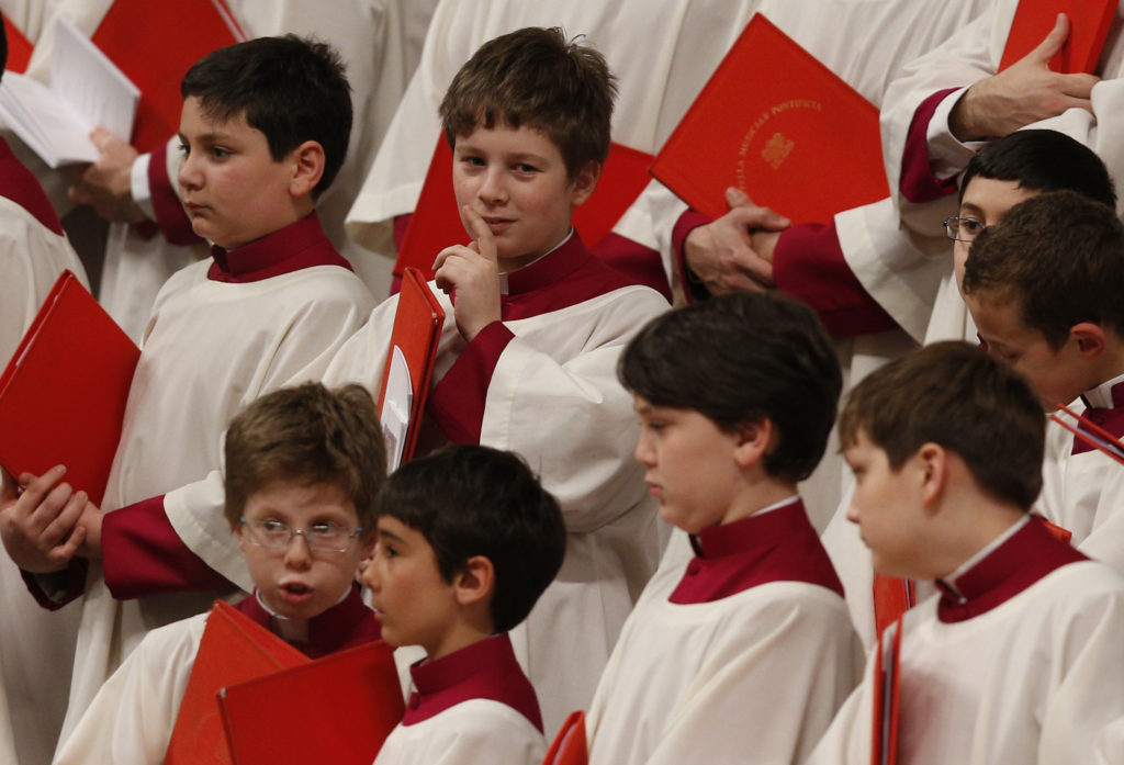 Boys in the Sistine Chapel choir are seen as Pope Francis leads a penitential liturgy in St. Peter's Basilica at the Vatican in this 2014 file photo. (CNS photo/Paul Haring)