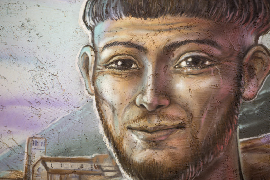 The face of St. Francis of Assisi and other details are seen on a mural at the Franciscan Renewal Center in Scottsdale, Ariz., in this 2014 file photo. Veteran David Campbell, who takes part in a healing program at the center, said of the saint,  "I like what he's been through. I like what he's come through." (CNS photo/Nancy Wiechec) 